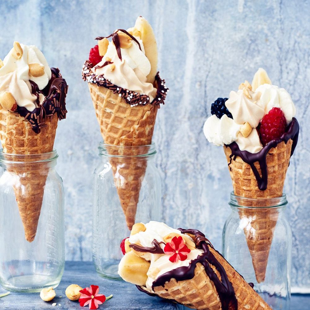 Ice cream cones with berries and chocolate