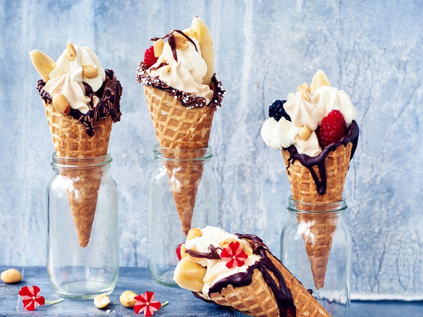 Ice cream cones with berries and chocolate