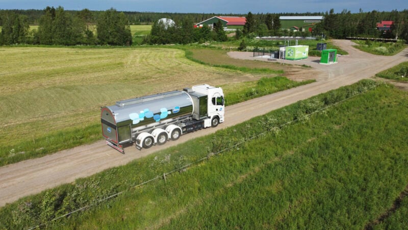 The picture shows a biogas-powered milk collection truck.